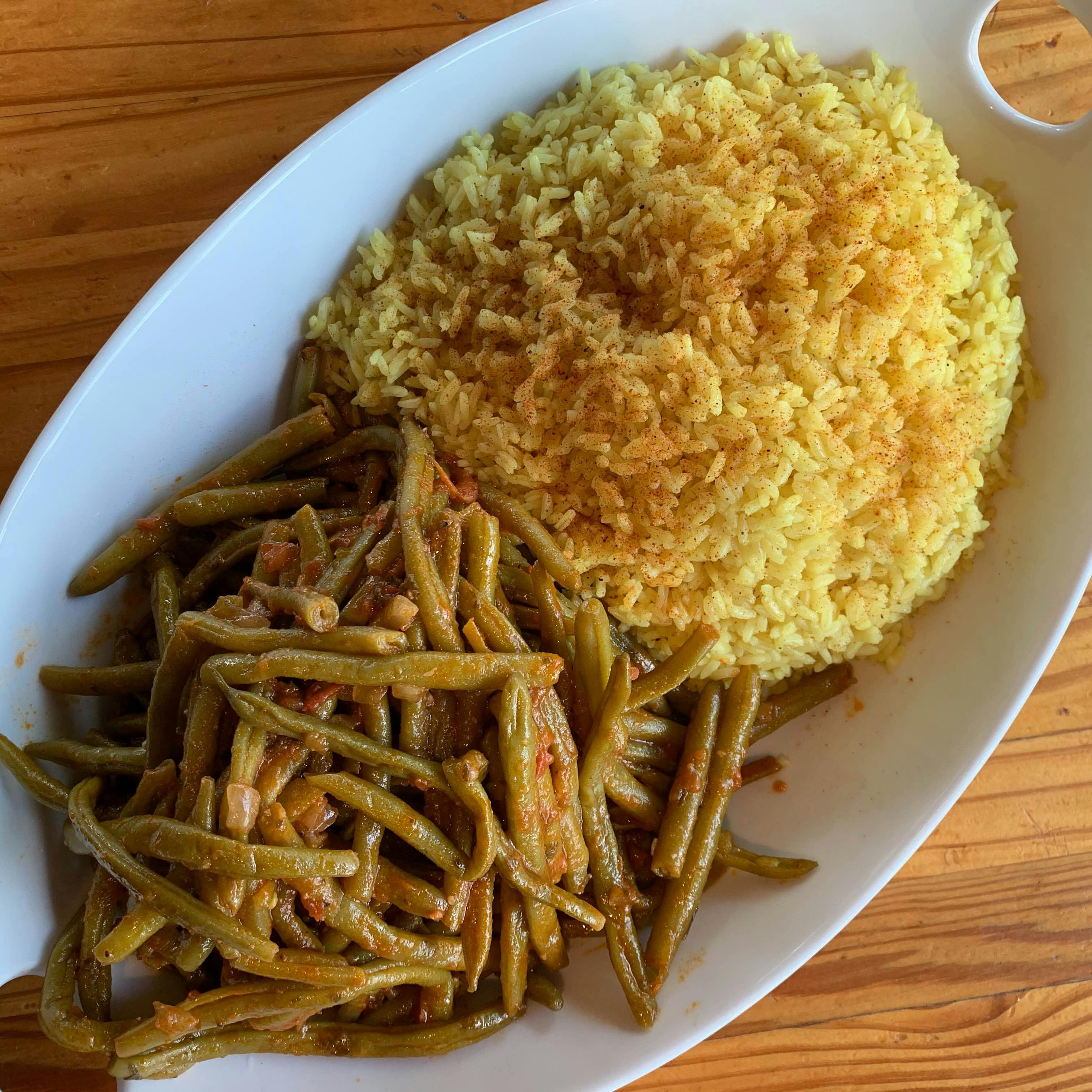 https://goldbelly.imgix.net/uploads/showcase_media_asset/image/104541/classic-greek-sides-rice-fasolakia.ae6097ff943922febfb8d4671f6f4dd3.jpg?ixlib=rails-3.0.2