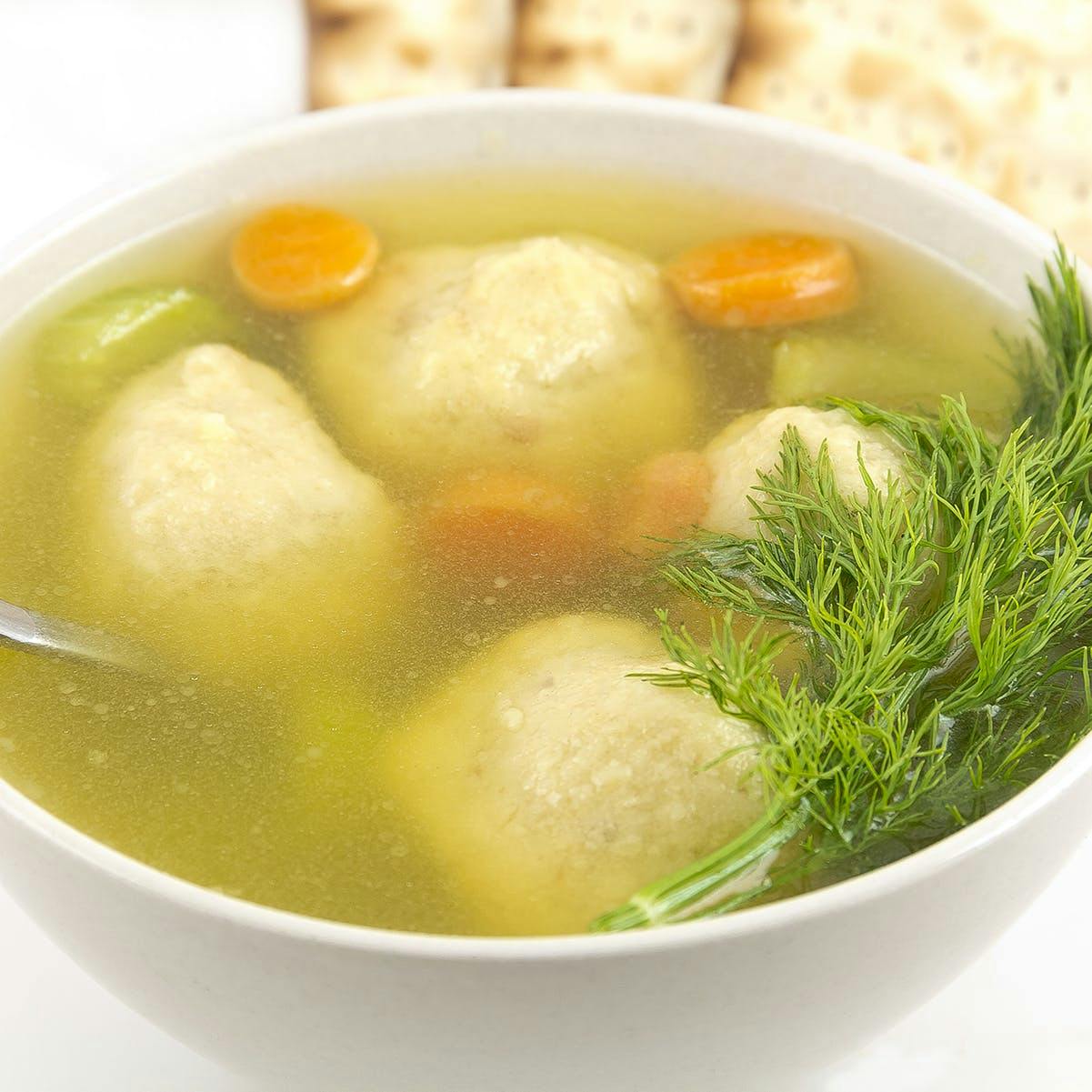 https://goldbelly.imgix.net/uploads/showcase_media_asset/image/107409/matzoh-balls-4-pack.5f678870aaea1f015bde57522031f450.jpg?ixlib=rails-3.0.2