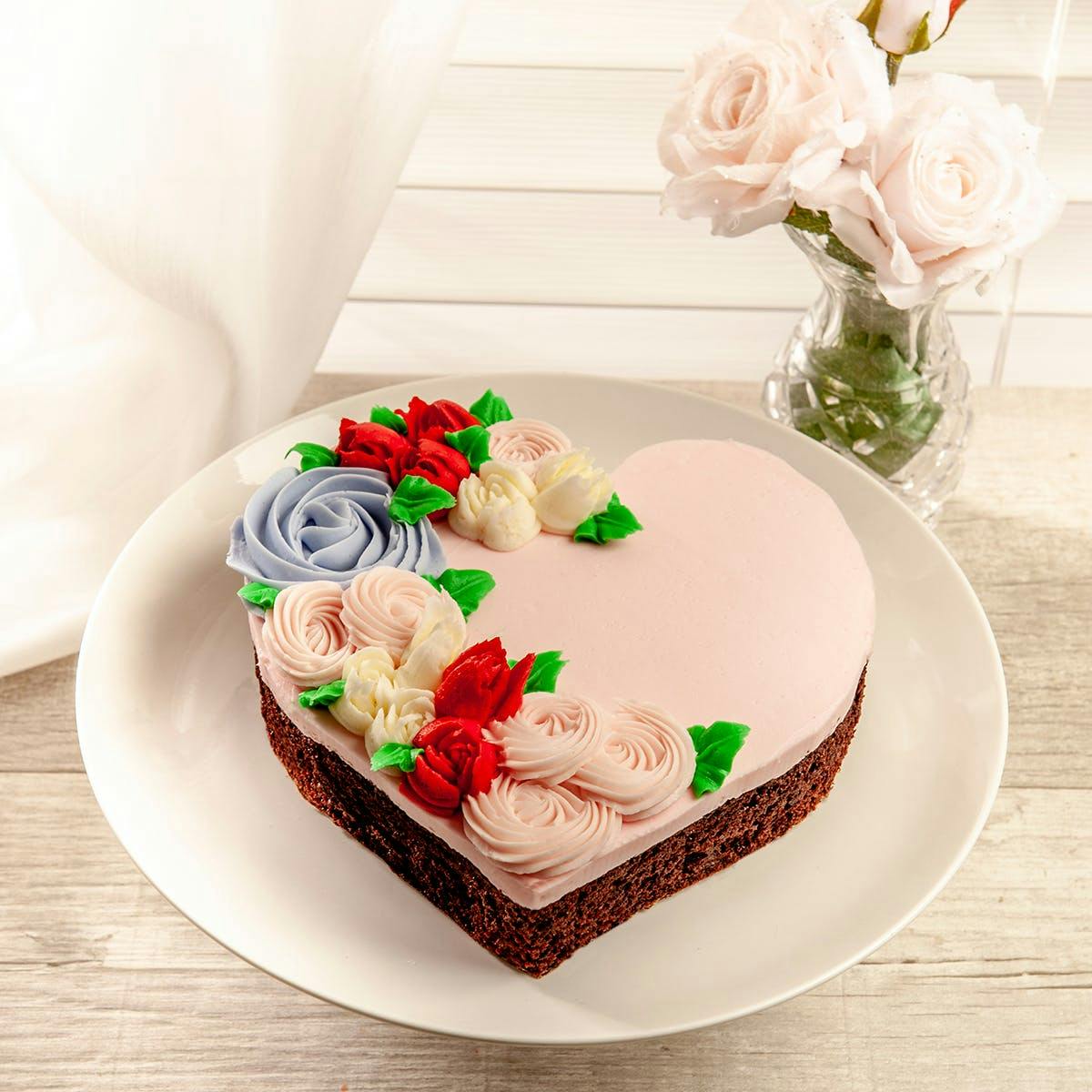 Heart Shaped Decorated Chocolate Cake by We Take the Cake