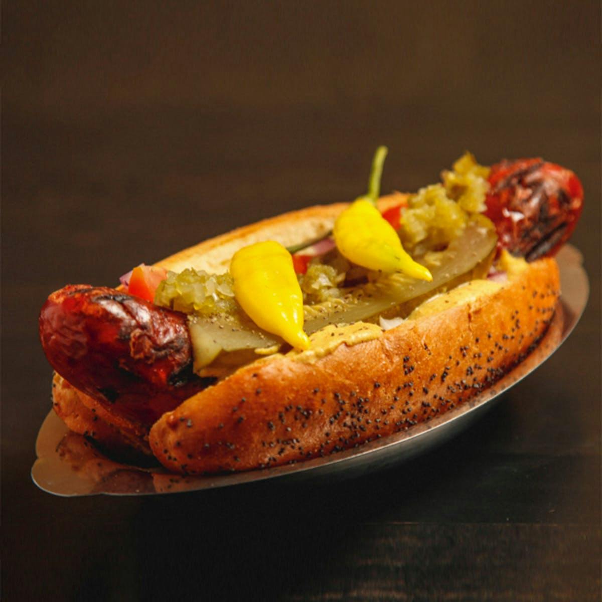 https://goldbelly.imgix.net/uploads/showcase_media_asset/image/118813/chick-inn-original-hot-dog-combo-kit-for-12.b85162b31929e026ebc11ac10d4a1031.jpg?ixlib=rails-3.0.2