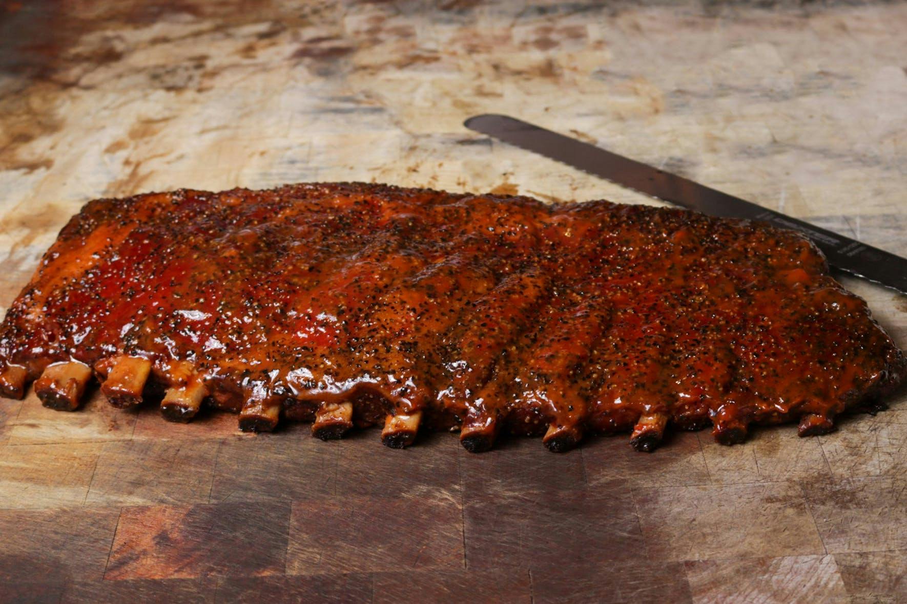Pork Spare Ribs - 1 Rack by Terry Black s Barbecue - Goldbelly