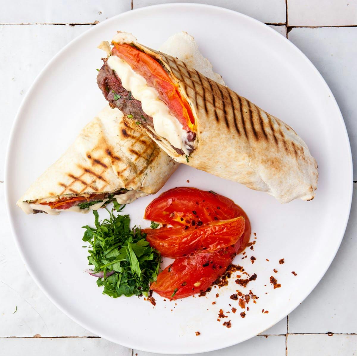 https://goldbelly.imgix.net/uploads/showcase_media_asset/image/120897/braised-beef-and-lamb-shawarma-kit-for-4.d5275d41f937b1f7ea5f6dfe4015e614.jpg?ixlib=rails-3.0.2