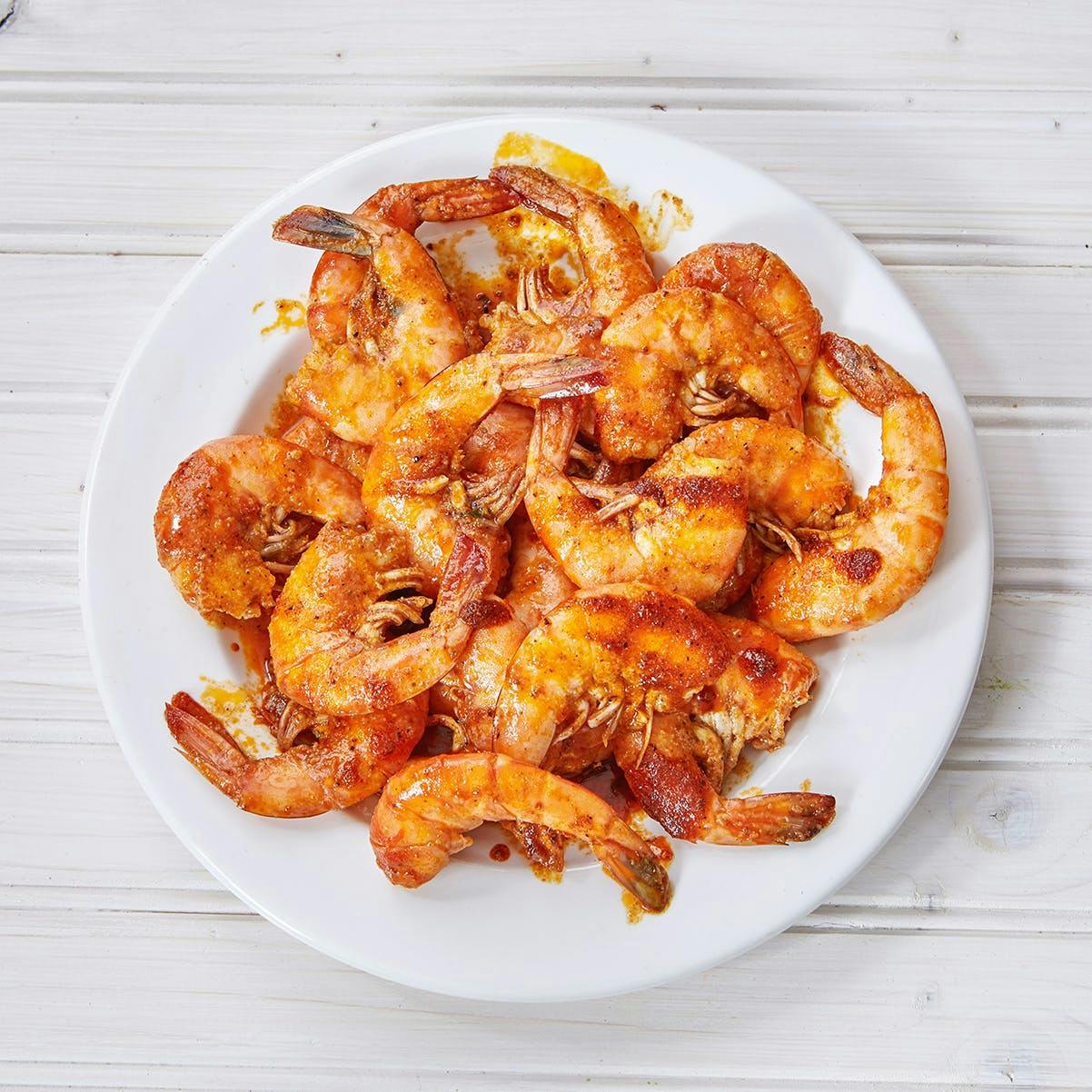 https://goldbelly.imgix.net/uploads/showcase_media_asset/image/122444/spicy-shrimp.c7738a83699701dfb8076349e61221be.jpg?ixlib=rails-3.0.2