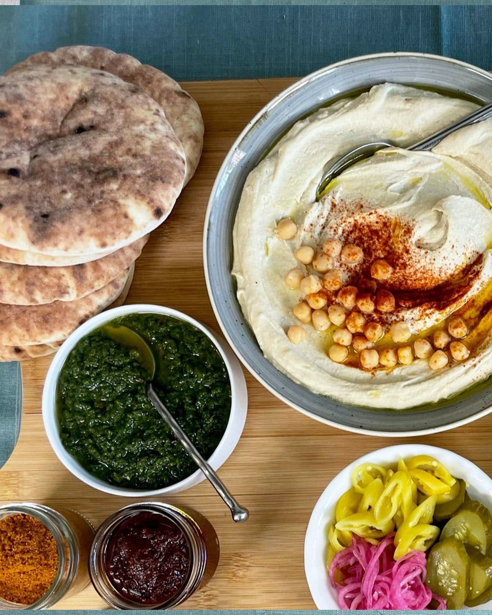 https://goldbelly.imgix.net/uploads/showcase_media_asset/image/122504/mediterranean-mezze-kit-for-6.2fe0b2f2228467eda8fd377594461a4f.jpg?ixlib=react-9.0.2&auto=format&ar=4%3A5