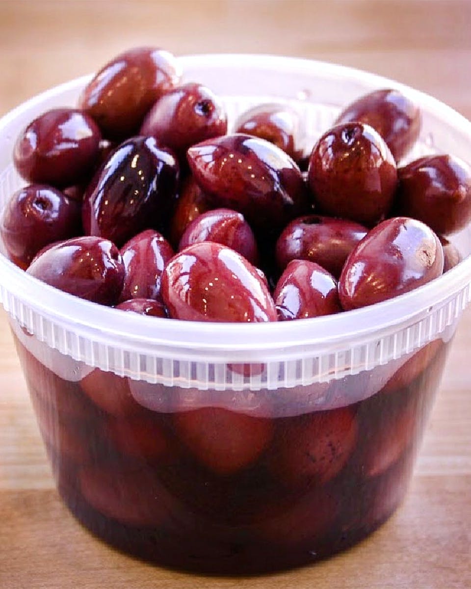 https://goldbelly.imgix.net/uploads/showcase_media_asset/image/132969/kalamata-olives-4-quarts.f038638a106fc3e6ee4b0a7c974a3e14.jpg?ixlib=react-9.0.2&auto=format&ar=4%3A5