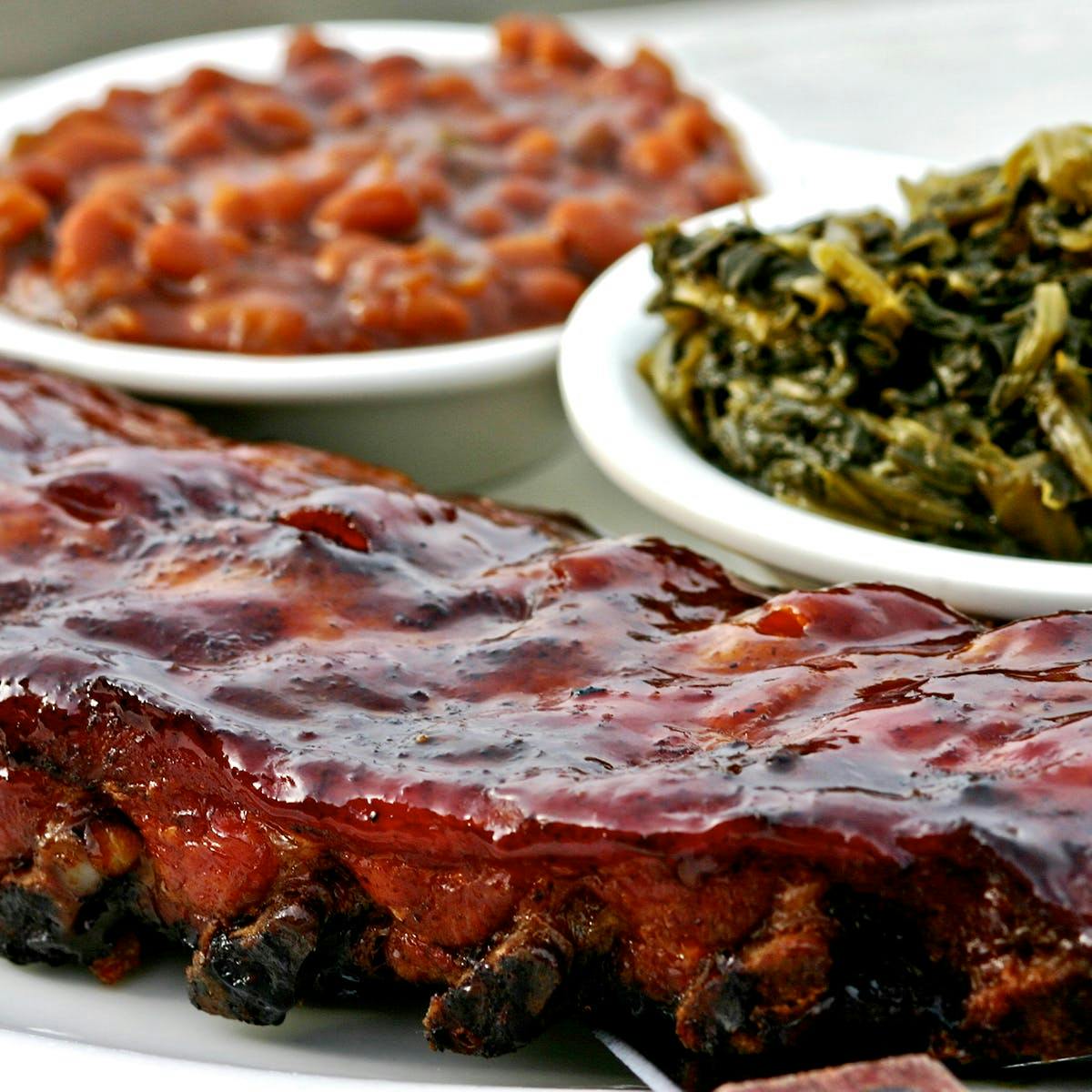 https://goldbelly.imgix.net/uploads/showcase_media_asset/image/133247/bbq-ribs-2-slabs.3d97cdf81e046ecf67c889cd8eafacd4.jpg?ixlib=rails-3.0.2