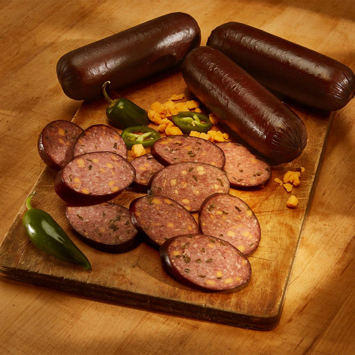 https://goldbelly.imgix.net/uploads/showcase_media_asset/image/133495/jalapeno-cheddar-beef-summer-sausage-3-pack.fb8864377da6554249c3de7db5adf5f7.jpg?ixlib=rails-3.0.2