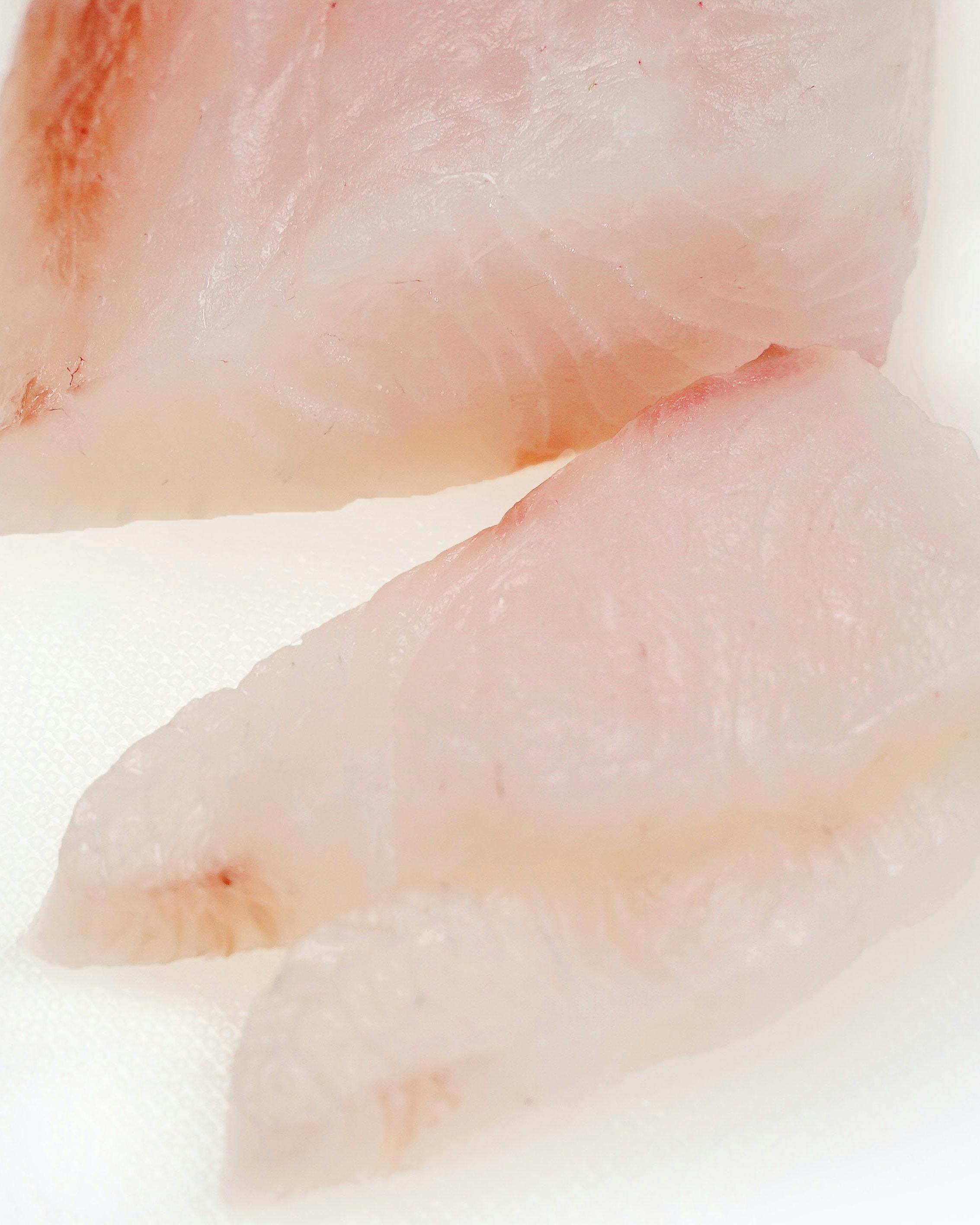 https://goldbelly.imgix.net/uploads/showcase_media_asset/image/133846/hawaiian-kanpachi-sashimi-cut.10b84cf46a353079eead0d92fff6203a.jpg?ixlib=react-9.0.2&auto=format&ar=4%3A5