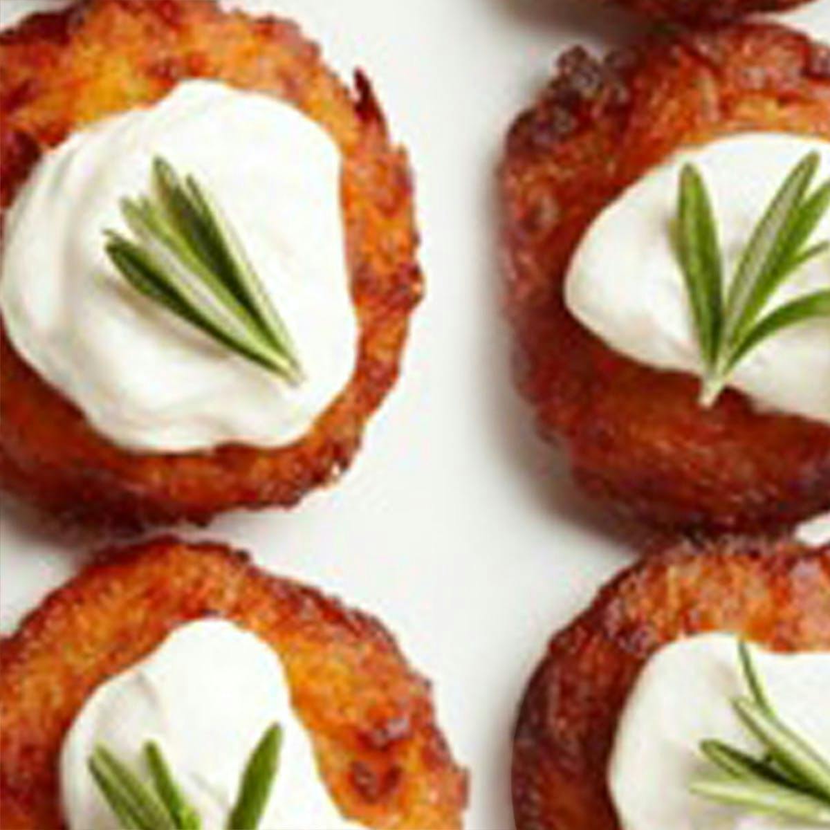 https://goldbelly.imgix.net/uploads/showcase_media_asset/image/134709/large-sweet-potato-latkes.a27a01e2fdb6403d817e942dd99a919a.jpg?ixlib=rails-3.0.2