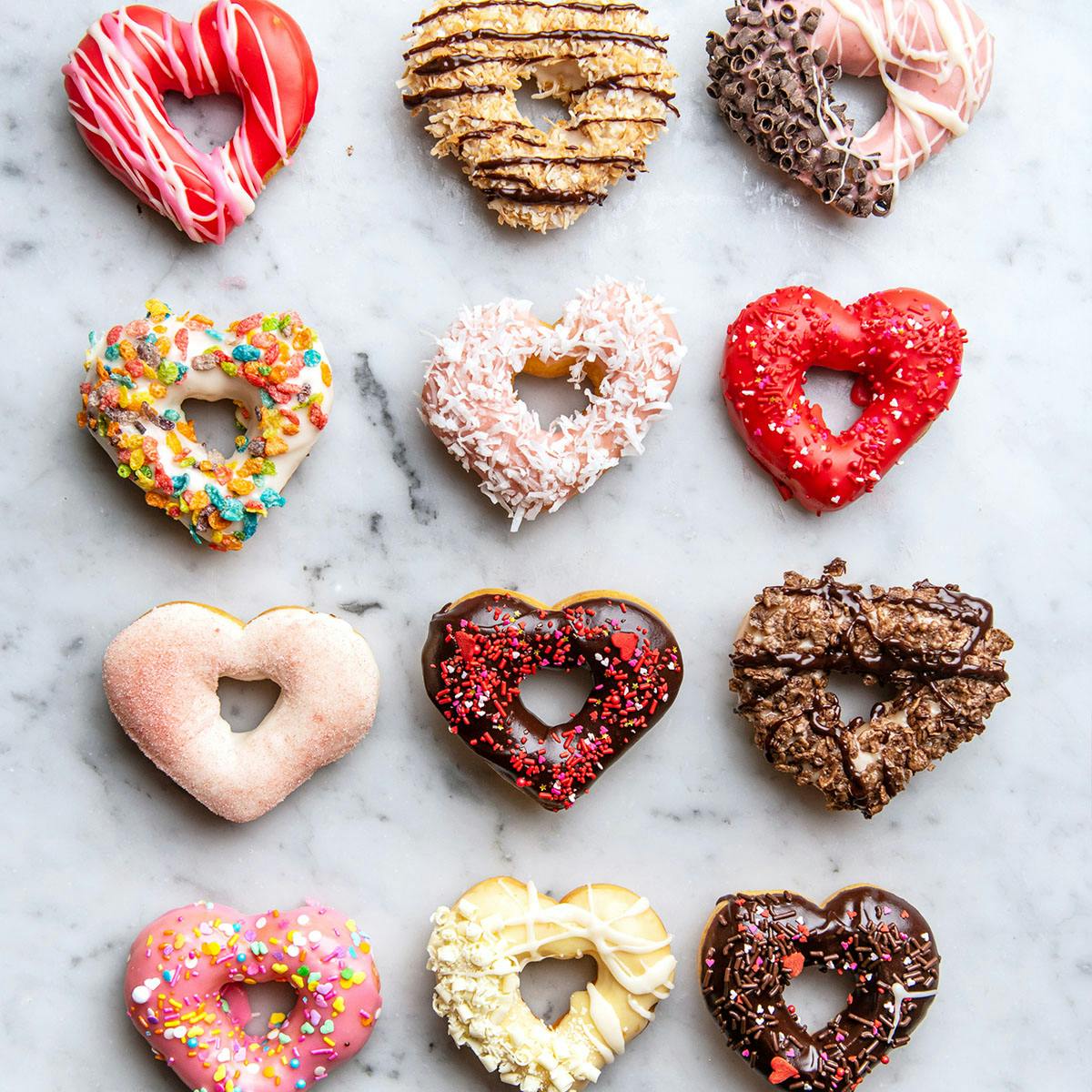 https://goldbelly.imgix.net/uploads/showcase_media_asset/image/156477/Angel-Food-Bakery-Dozen-Hearts-2.jpg?ixlib=rails-3.0.2
