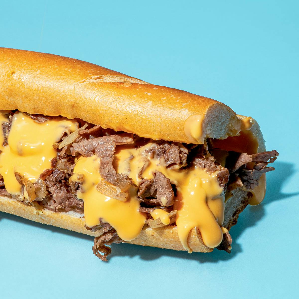 Authentic Philly Cheesesteak Sandwich - Alphafoodie