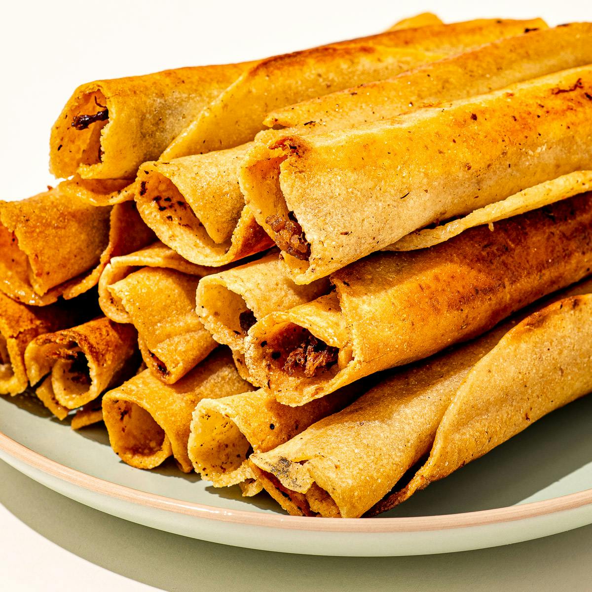 Beef Taquitos + Refried Beans by Cielito Lindo - Alternate image 2