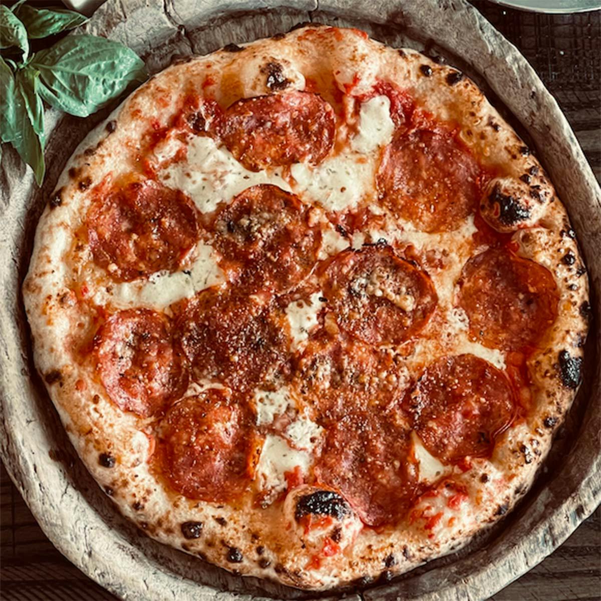 https://goldbelly.imgix.net/uploads/showcase_media_asset/image/174629/DoughPizzeriaNapoletana-Sopressata-Pepperoni.jpg?ixlib=react-9.0.2&auto=format&ar=1%3A1