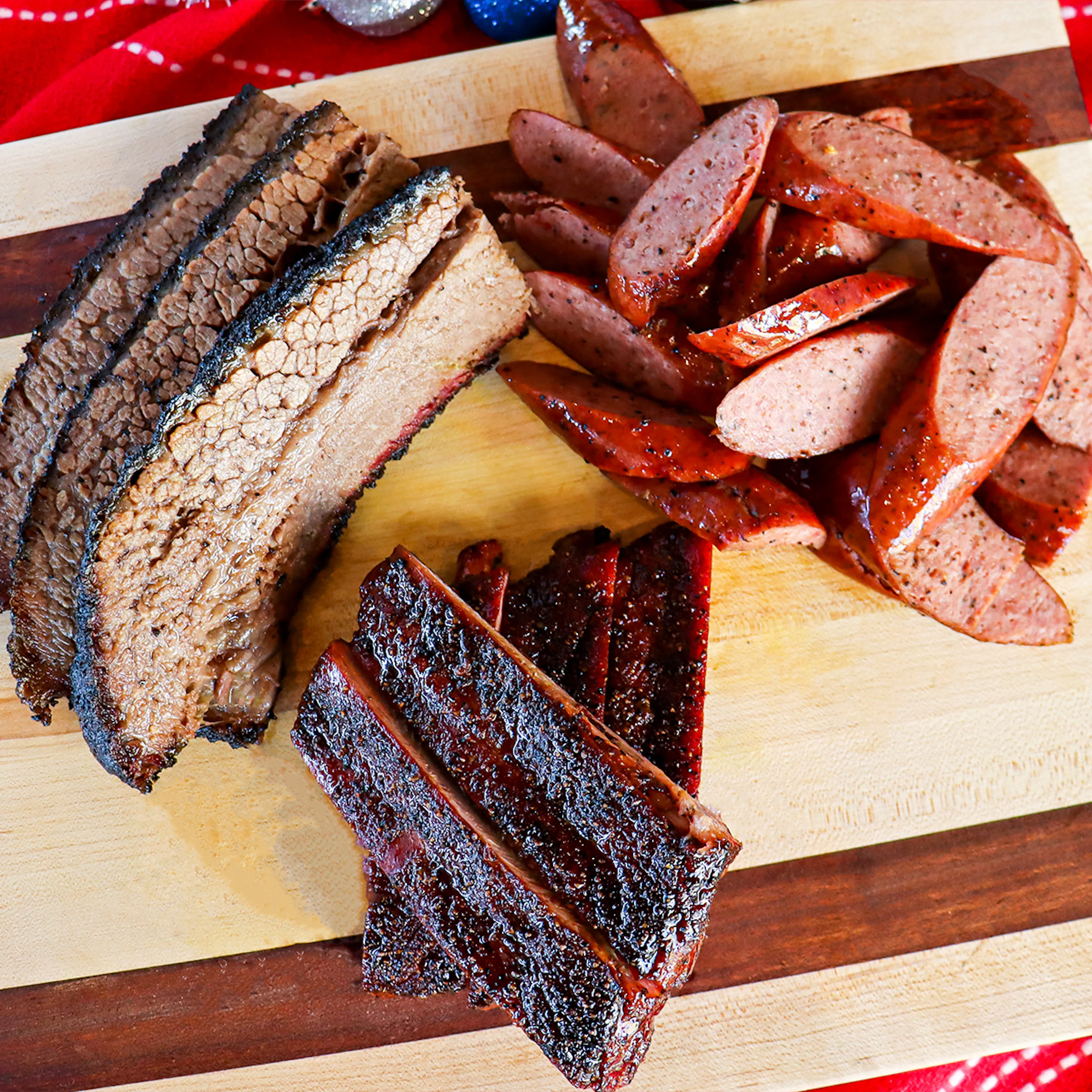 Ribs + Brisket + Sausage for 6-8 by Feges BBQ