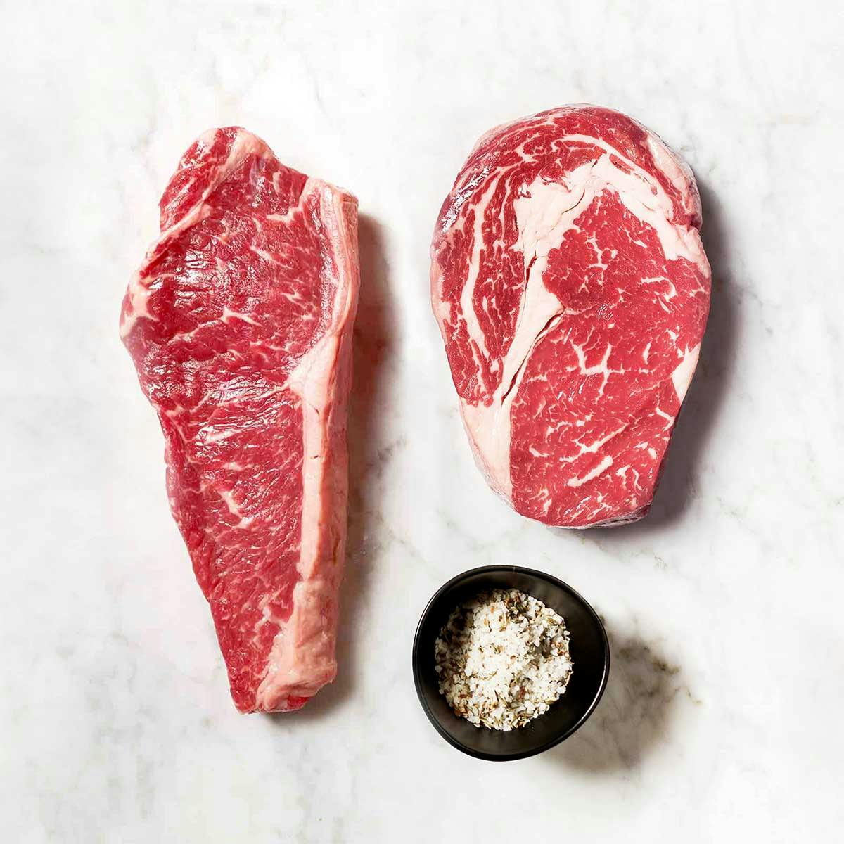 75-Day Wet Aged Australian Ribeye + Strip Steaks - 4 Pack by Gibsons Steakhouse - Alternate image 1