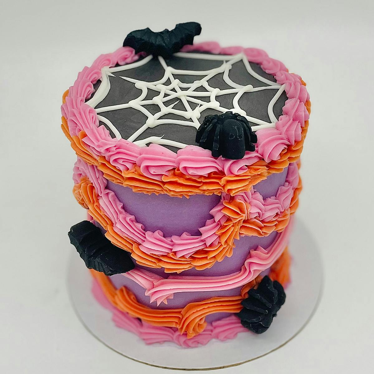 https://goldbelly.imgix.net/uploads/showcase_media_asset/image/198983/Erin-McKennas-Bakery-Mini-Halloween-Cake2.jpg?ixlib=rails-3.0.2