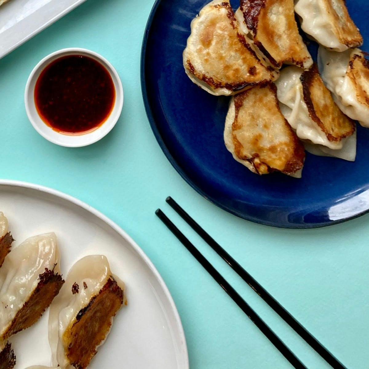 Signature Dumplings + Scallion Pancakes + Sauce for 6-8 by Mimi Cheng's Dumplings