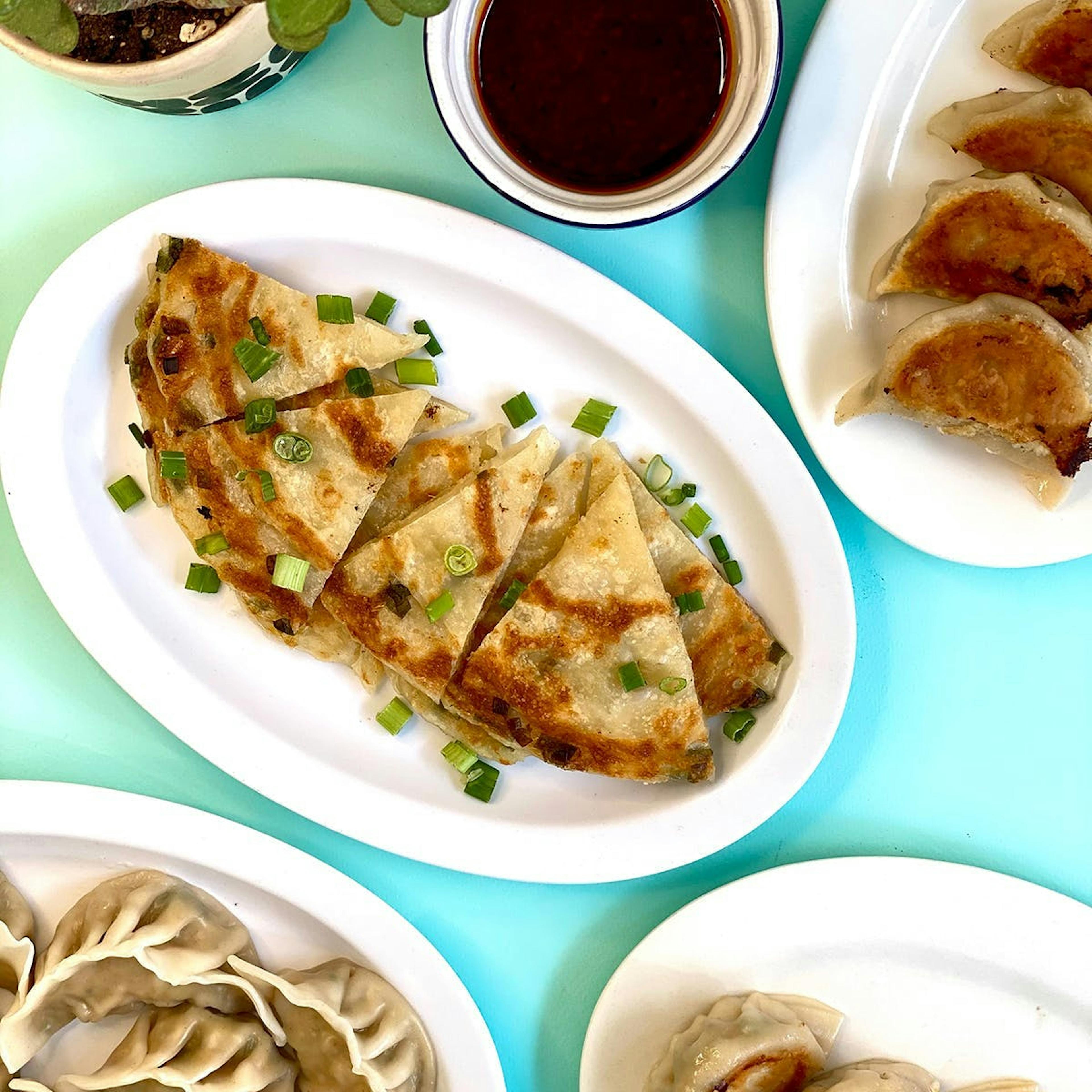 Signature Dumplings + Scallion Pancakes + Sauce for 6-8 by Mimi Cheng's Dumplings - Alternate image 1