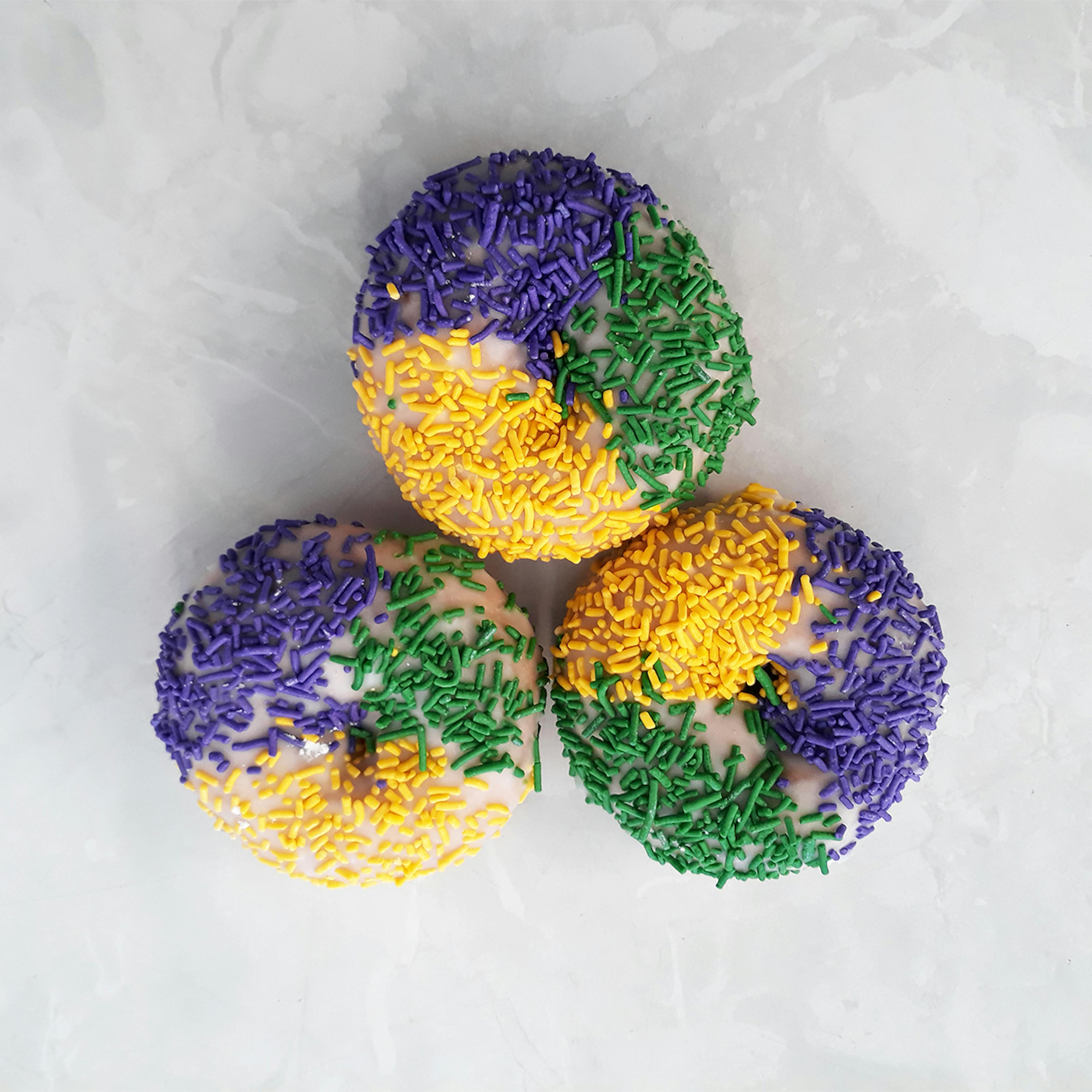 Mardi Gras Cake Donuts by Primo's Donuts