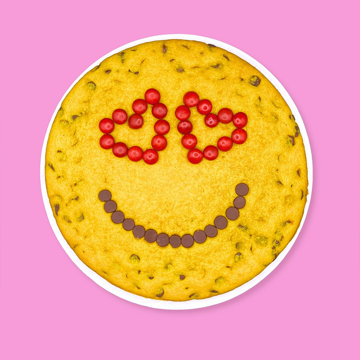 Red Heart Eyes Emoji Chocolate Chip Cookie Cake by Baked in Color