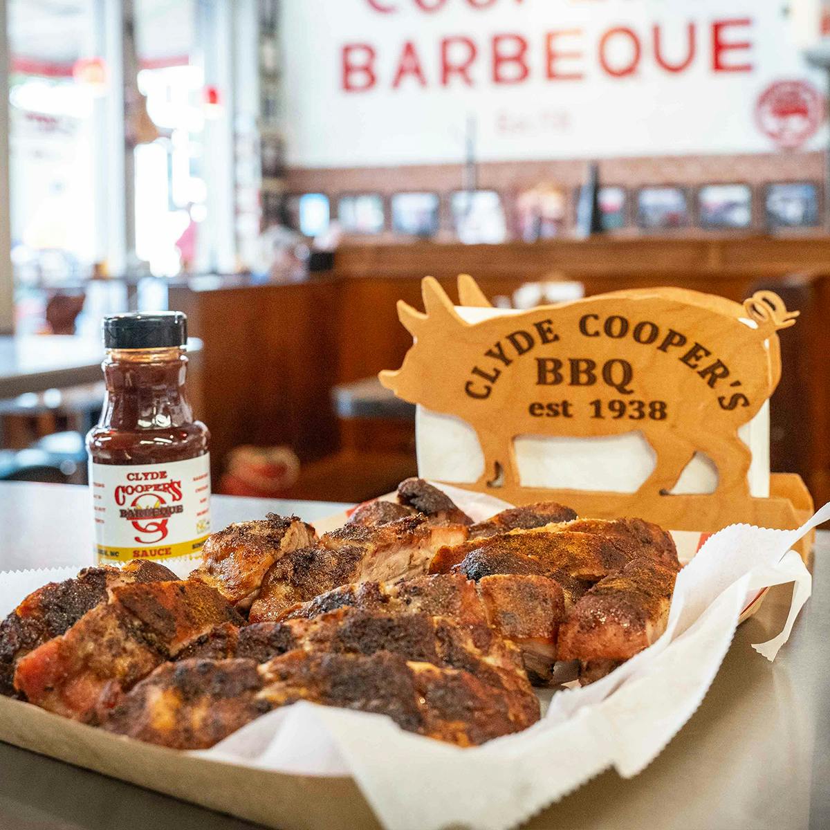 Baby Back Ribs + BBQ Sauce by Clyde Cooper's Barbeque