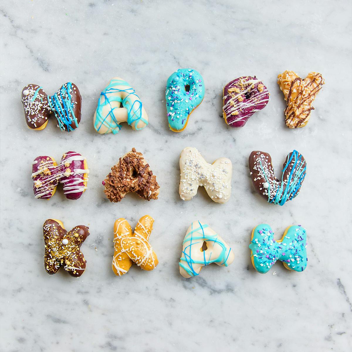 "Happy Hanukkah" Message Donuts by Angel Food Bakery