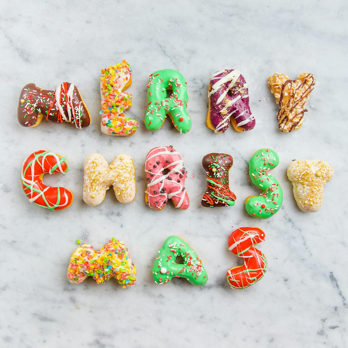 "Merry Christmas" Message Donuts by Angel Food Bakery