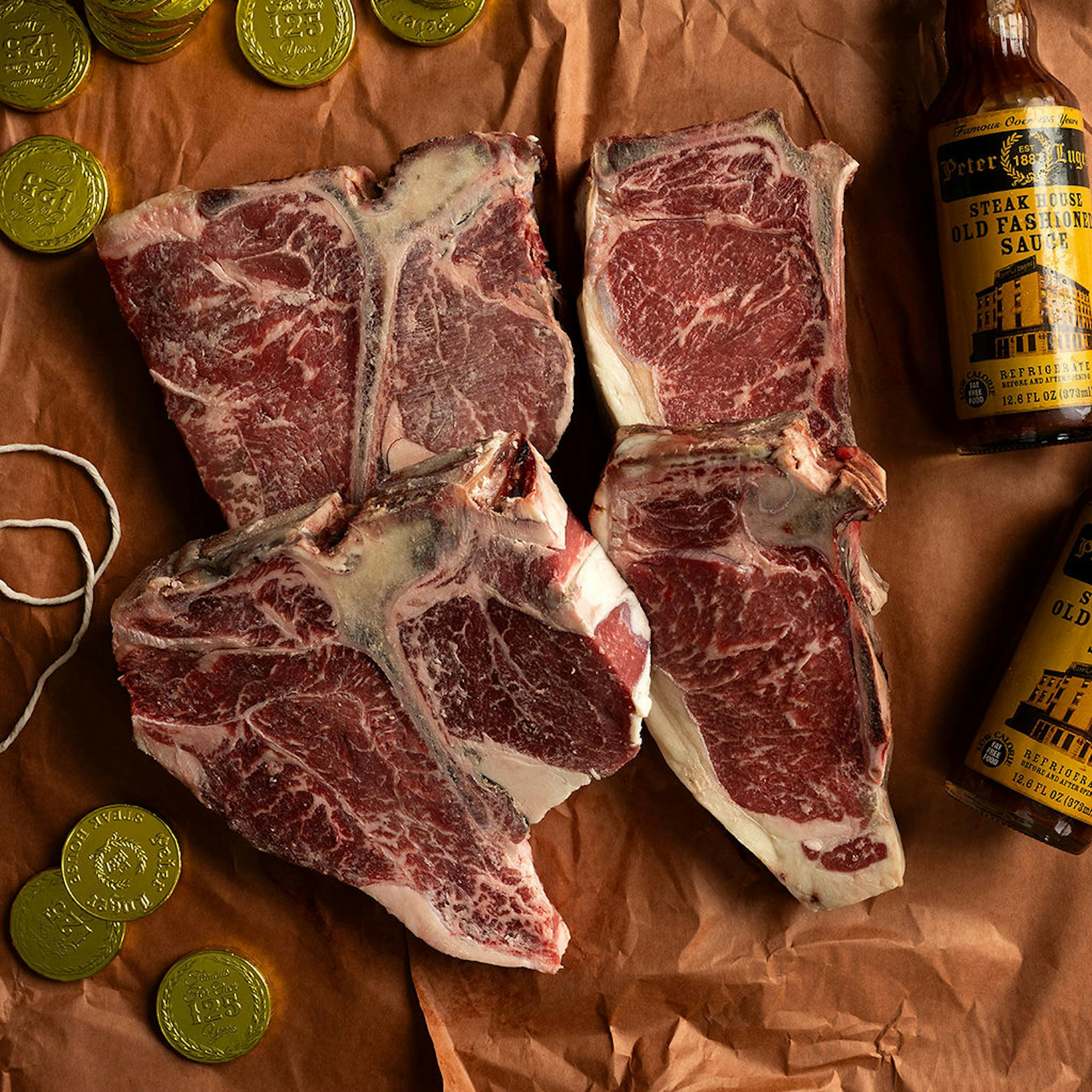 USDA Prime Dry-Aged Porterhouse + Strip Steaks by Peter Luger Steak House