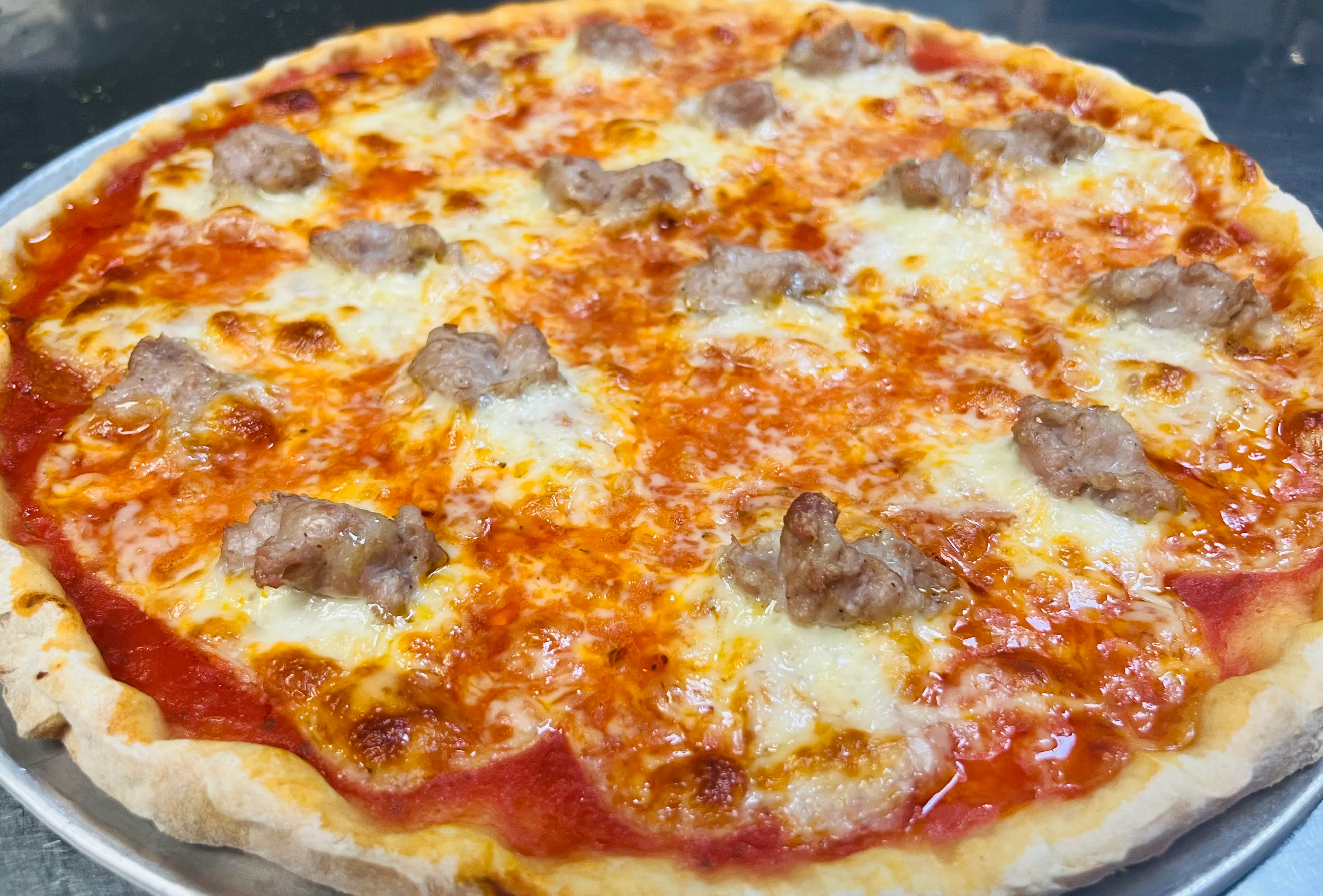 "3 Meat" Sausage, Pepperoni, & Canadian Bacon Pizza by Sammy's Pizza