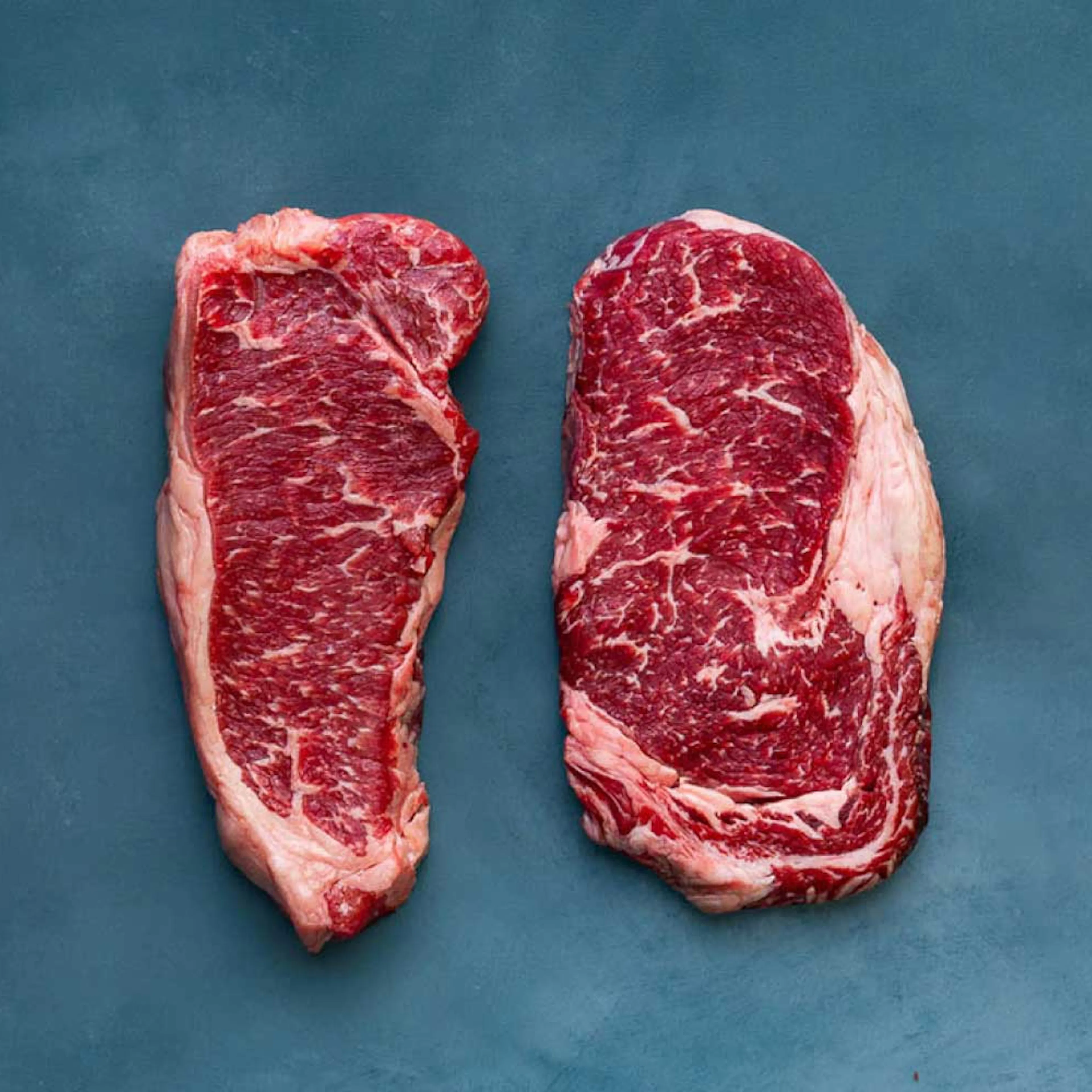 Akaushi Wagyu Boneless Ribeyes + NY Strip Steaks by Heritage Foods
