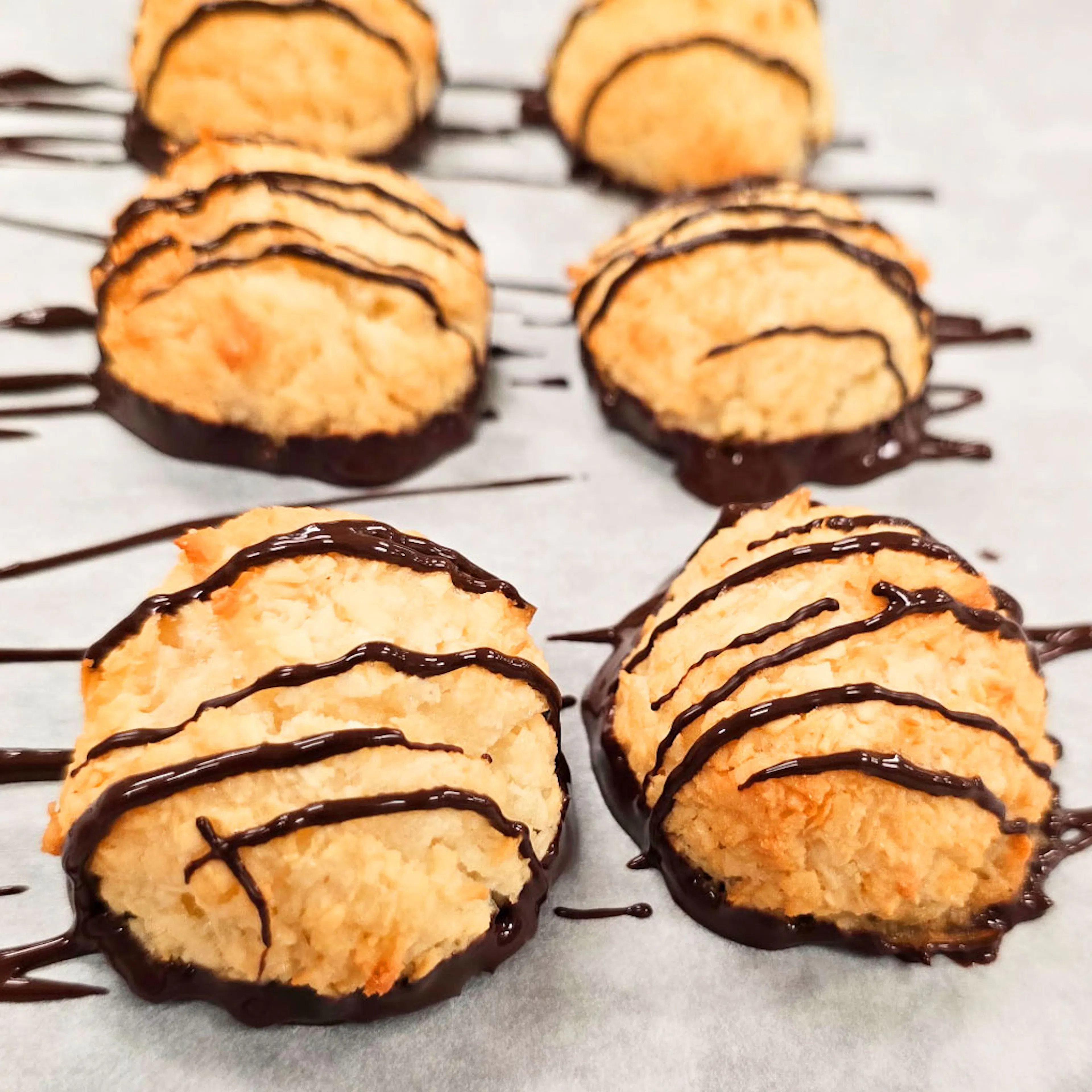 Chocolate Drizzled Coconut Macaroons by Butter Maid Bakery