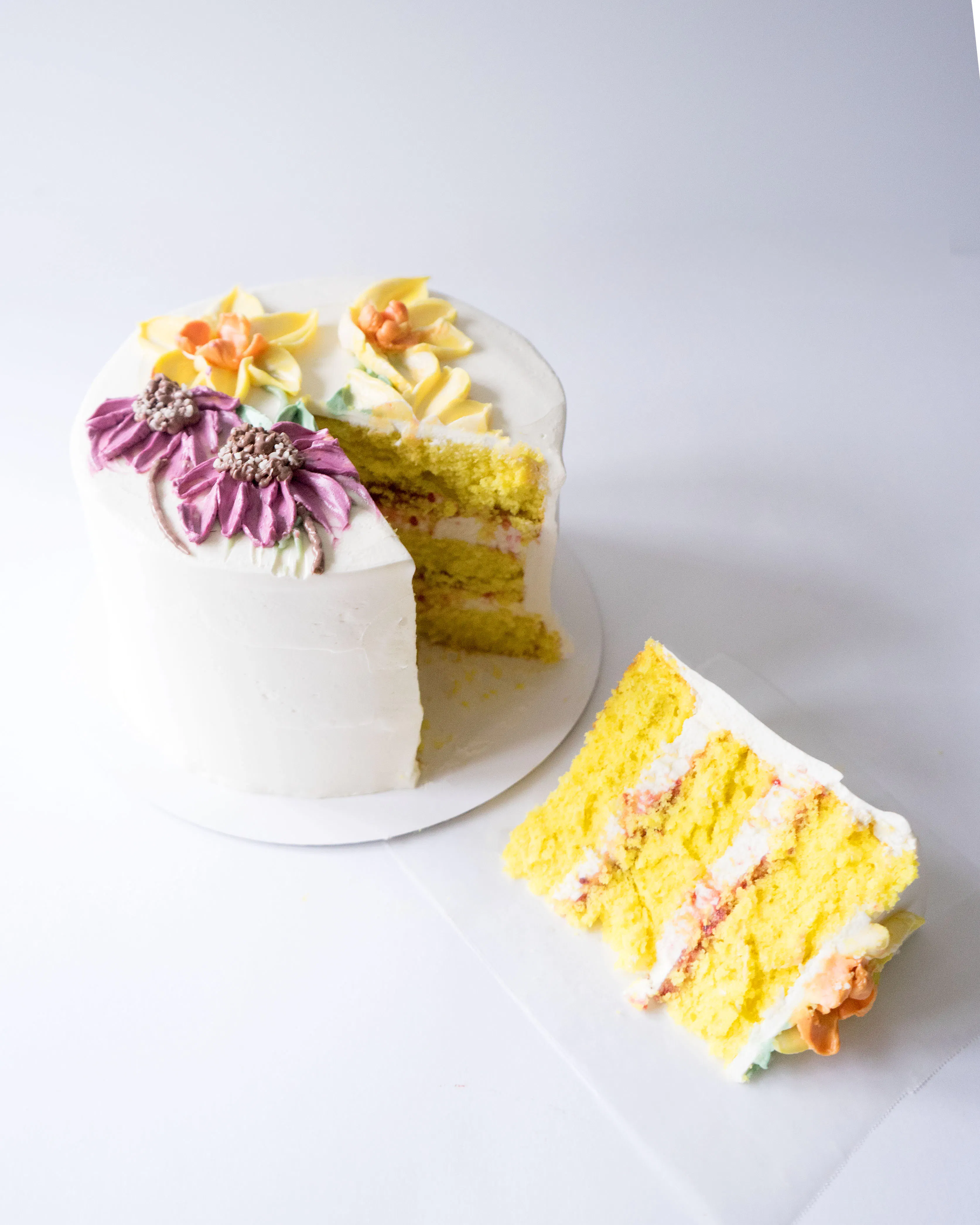 Floral Decorated Lemon Raspberry Cake by Miri Nadler Cakes