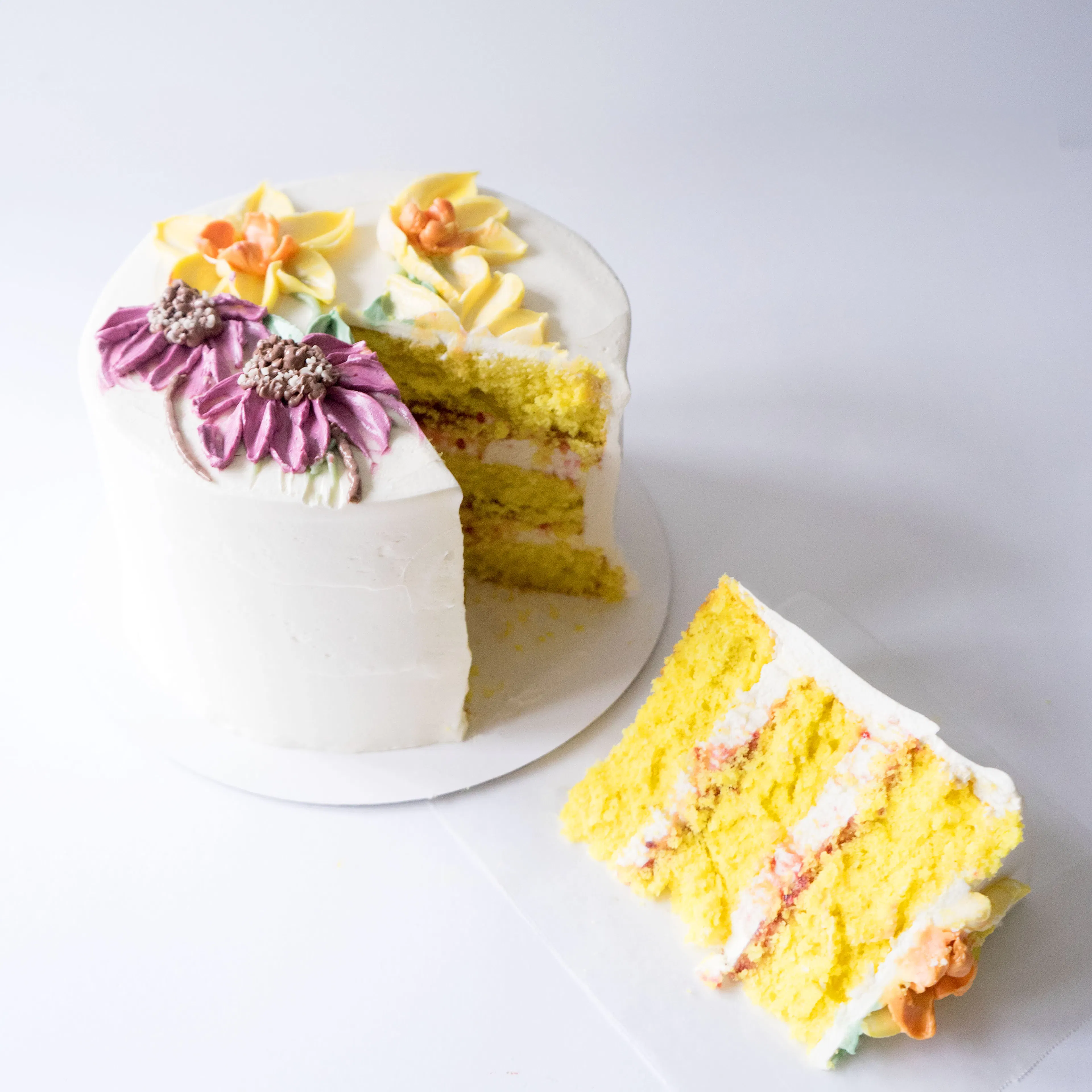 Floral Decorated Lemon Raspberry Cake by Miri Nadler Cakes