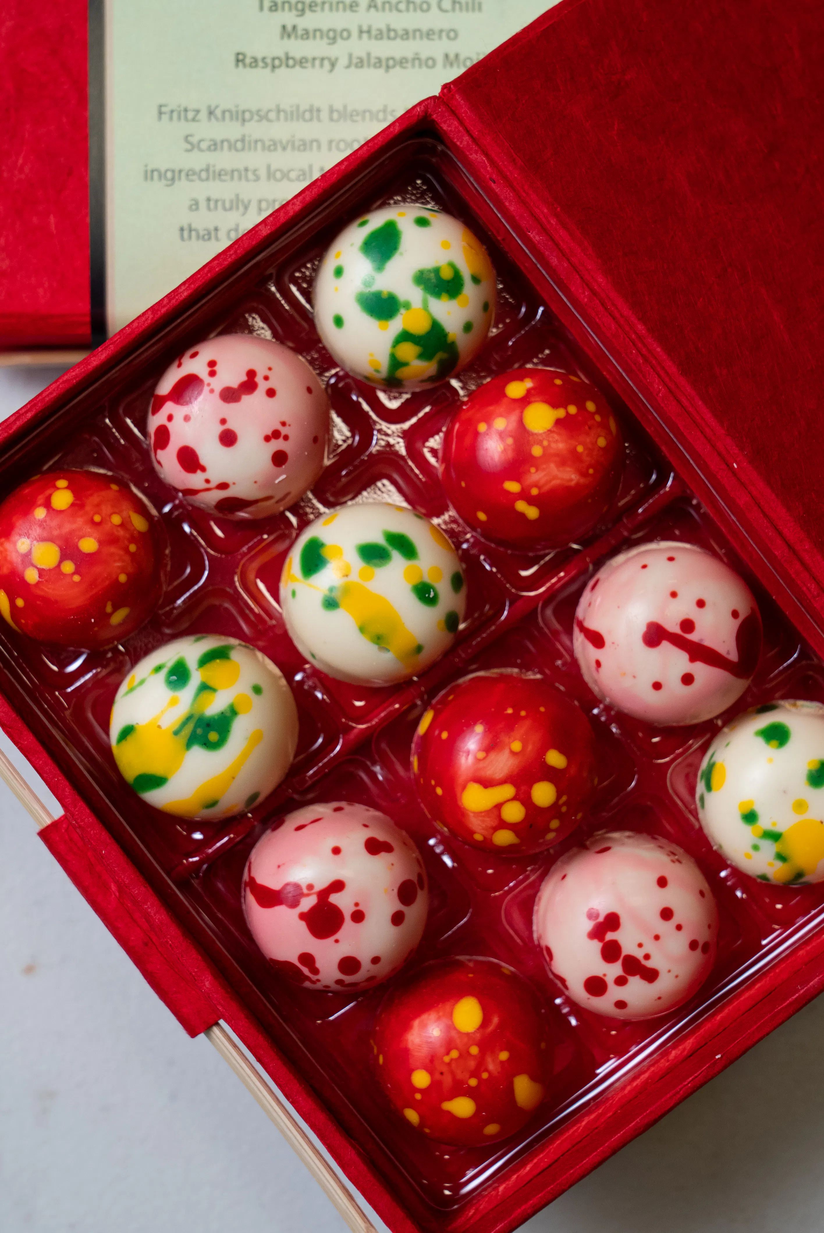 Spicy Trio Bon Bons - 12 Piece by Knipschildt Chocolatier | Goldbelly