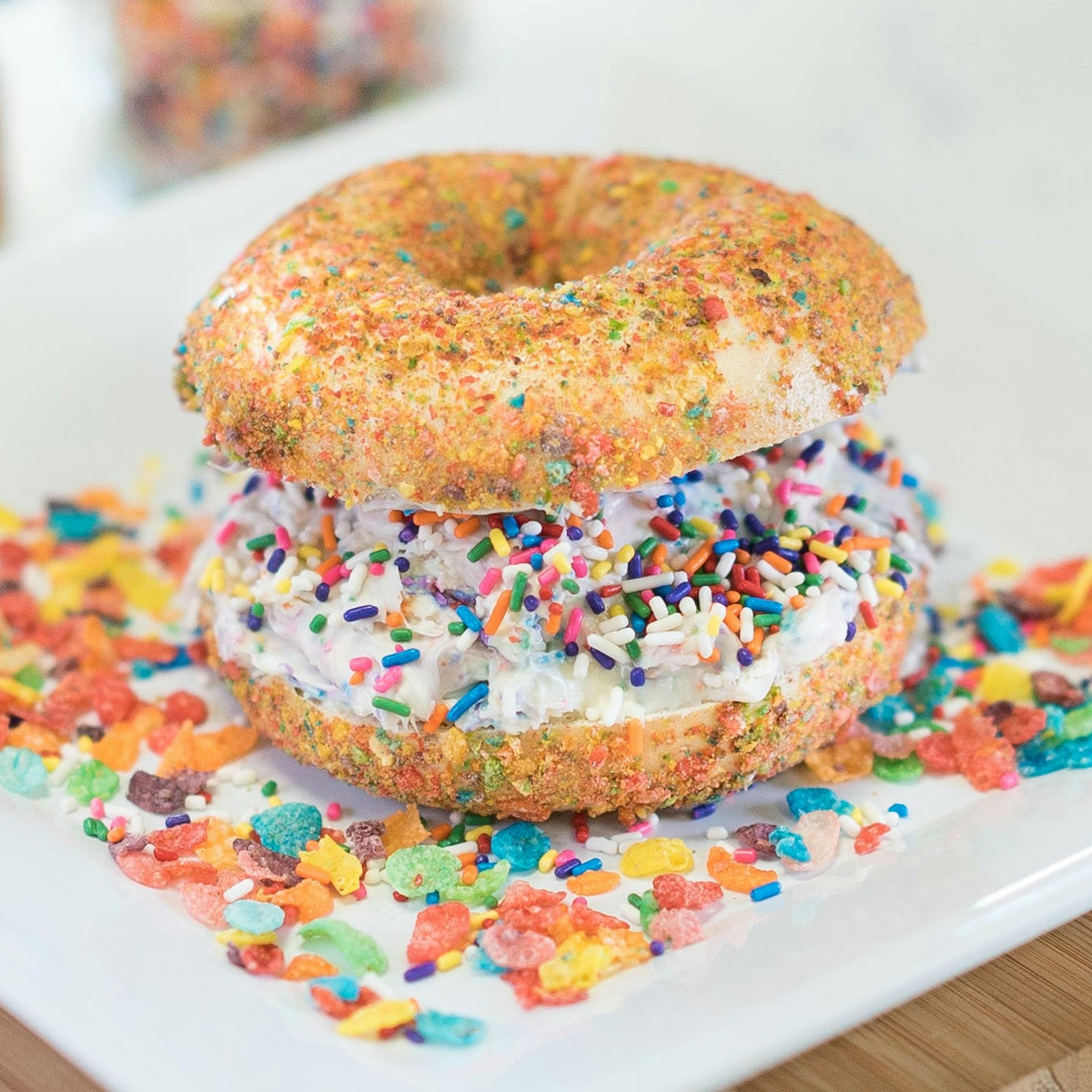 Overloaded Fruity Pebbles Bagel + Cream Cheese by The Bagel Nook