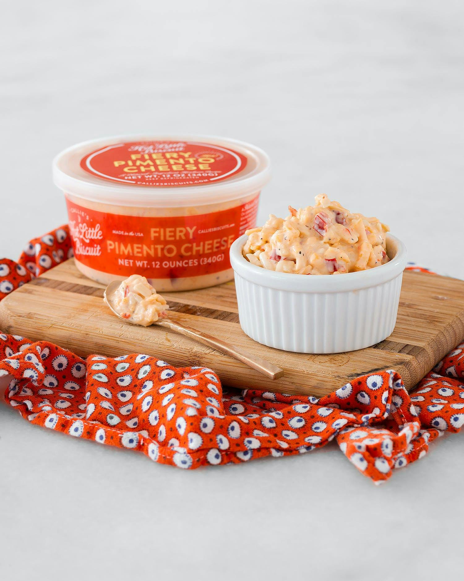 https://goldbelly.imgix.net/uploads/showcase_media_asset/image/84005/pimento-cheese-fiery-2-pack.3a07ba9f9464aa7cfac92f5add8e3636.jpg?ixlib=react-9.0.2&auto=format&ar=4%3A5