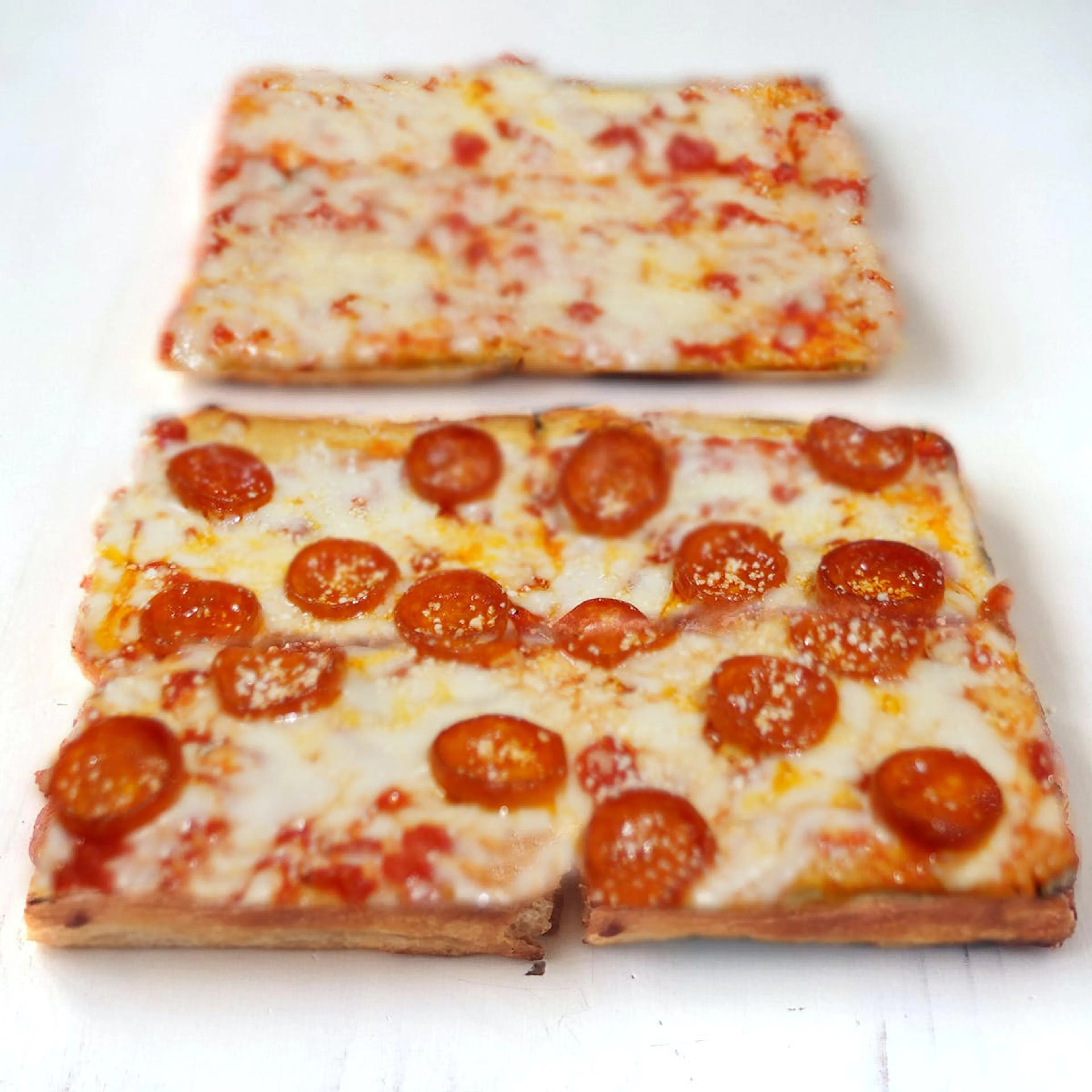 Square Cheese Pizza Slice Delicious Square Pizza Topped With Melted