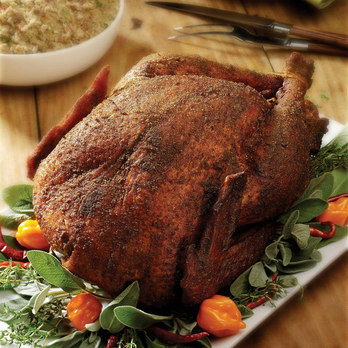 https://goldbelly.imgix.net/uploads/showcase_media_asset/image/94526/cajun-spiced-turkey-9-lbs.3dc46d08c1e711ee06e8134405e4038a.jpg?ixlib=rails-3.0.2