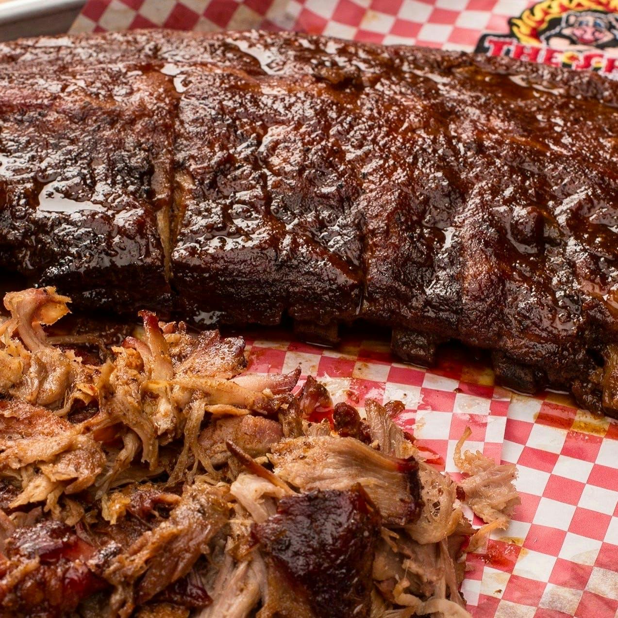 https://goldbelly.imgix.net/uploads/showcase_media_asset/image/96242/bbq-ribs-and-pulled-pork-dinner-for-6.ba9ea2ed663fc67effa9fd7a85624625.jpg?ixlib=rails-3.0.2