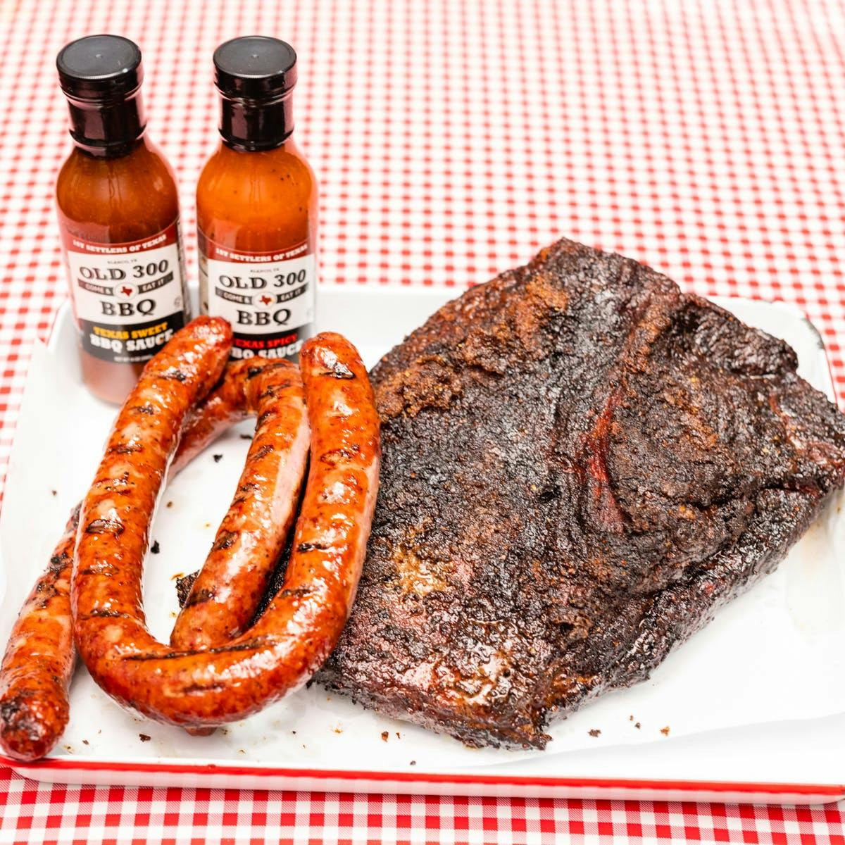 Whole Brisket and Sausages by Old 300 BBQ