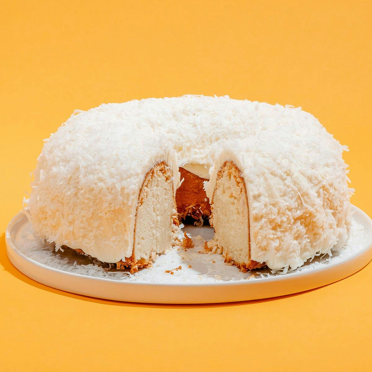Gluten-Free Coconut Cake with White Chocolate Whipped Cream Icing | Edible  Nashville