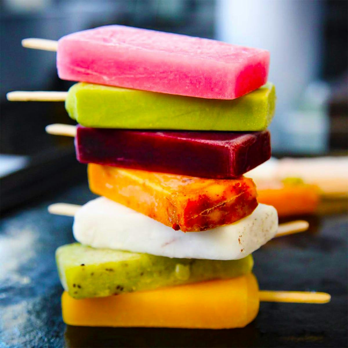 https://goldbelly.imgix.net/uploads/showcase_media_asset/image/97633/fruity-paletas-assorted-dozen.28537e4eaa497cb33518d9ece4c47001.jpg?ixlib=rails-3.0.2